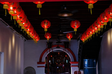 Traditional Asian lantern on the ceiling in a row