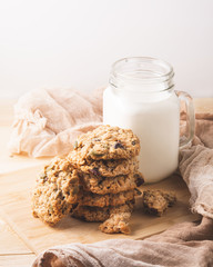 cookies and milk on wooden table