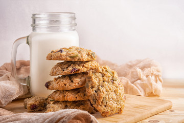 cookies and milk on wooden table