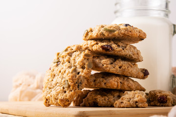 cookies and milk on wooden background