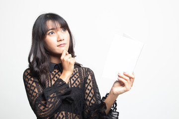 Naklejka premium Young Asian woman with a book is thinking.