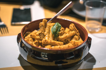 Pesto pasta served in the restaurant, macaroni