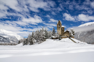 Protestant church San Gian with unstored tower in Celerina near St. Moritz, Canton Grison, Switzerland