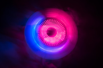Concept of speed - Trail of fire and smoke - Vinyl record. Burning vinyl disk. Turntable vinyl record player. Retro audio equipment for disc jockey. Sound technology