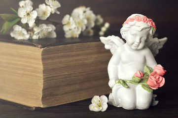 Sympathy card with guardian angel and spring flowers