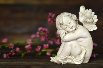 Guardian angel and spring flowers