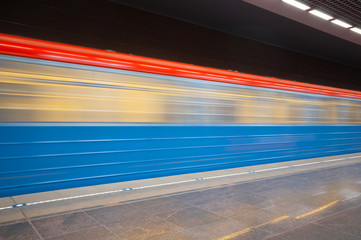 Moving train at subway station