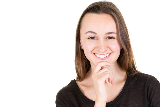 Portrait of beautiful teen girl smiling isolated on white background with copy space on the left of the image