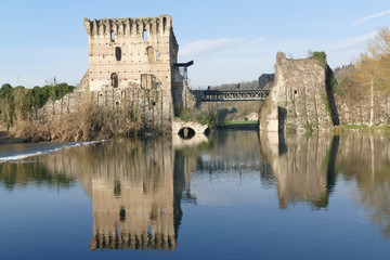 panorama of Roman bridge on Mincio river from the medieval village of Borghetto