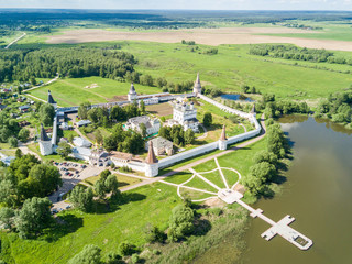 Joseph-Volokolamsk lavra or Josepho-Volotsky monastery, and a lake, near Volokolamsk, Moscow Oblast, Russia. Russian Eastern Orthodox Christian Church and a white-wall medieval fortress or kremlin
