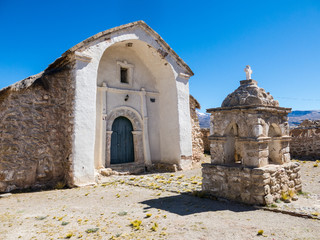 Stone church of the village of Sajama. The small Andean town of Sajama, Bolivian Altiplano. South America