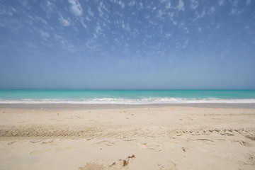Fototapeta na wymiar horizon with amazing tropical beach shore, sea and sky on an island