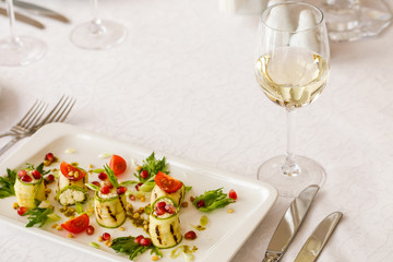 Spring salad and a glass of white wine