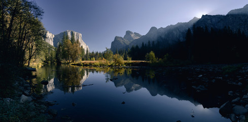 El Capitan and autumn colors reflected in the Merced River in early morning light in Yosemite National Park