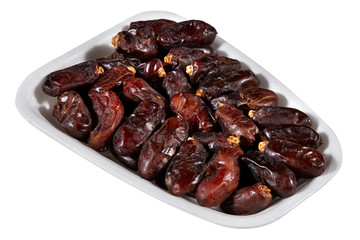 dried dates,plastic tray of dried dates isolated on white background