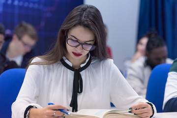 Young female student in math class overwhelmed by the math formula. Pressure, Education, Success concept.