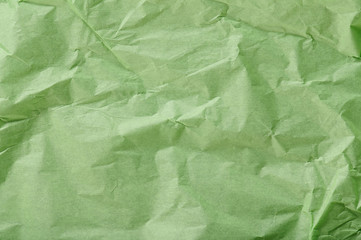 Green wrinkled paper background