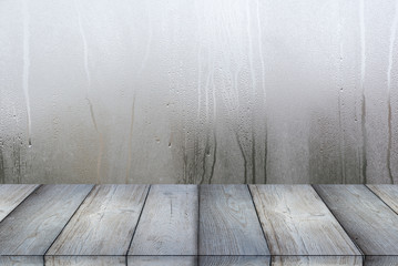 Wet Window or Glass and empty Table or Shelf as Background