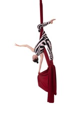 Graceful girl in striped body hanging on cloth