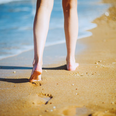 woman walking at the beach