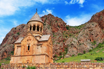 Scenic Novarank monastery in Armenia. against dramatic sky. Noravank monastery was founded in 1205. It is located 122 km from Yerevan in narrow gorge made by Darichay river nearby city of Yeghegnadzor