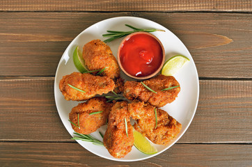 Grilled chicken wings with sauce