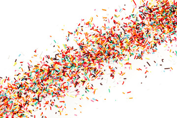 Multicolored Sugar sprinkle dots, decoration for cake. copy space