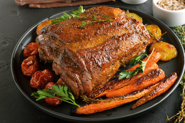Grilled pork, fried potatoes and carrots