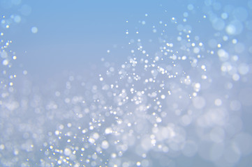 Glitter abstract lights background. Defocused bokeh illustration