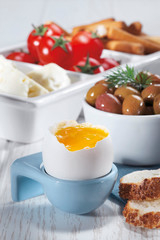 Fototapeta premium Boiled eggs on wooden background