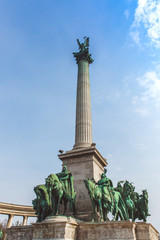 Millennium Monument on the Heroes' Square. Blurred-unrecognizable faces of people. Is one of the most-visited attractions in Budapest squares in Budapest, Hungary.