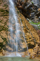 Fototapeta na wymiar Rinka Falls is a waterfall in the Logar Valley, northern Slovenia
