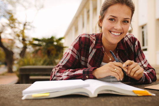 Girl Student Studying At University Campus