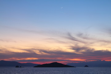 Seaside town of Turgutreis and spectacular sunsets with new moon