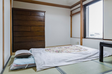 Fototapeta na wymiar Japanese style mattress in a small bedroom