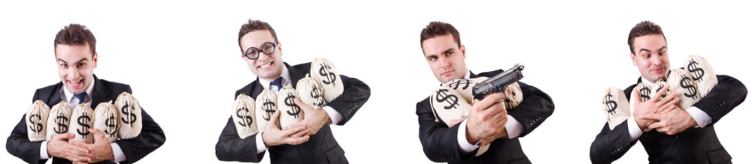 Businessman with money sacks and handgun 