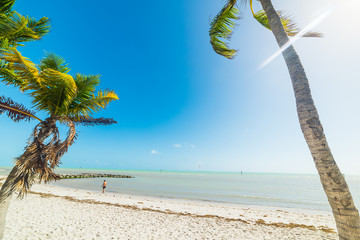 Sun shining over beautiful Smathers Beach in Key West