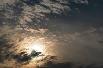 sun on dramatic moody sky