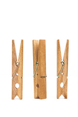 Wood clothespins isolated on white background object concept
