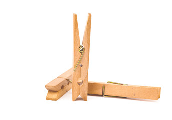 Wood clothespins isolated on white background object concept
