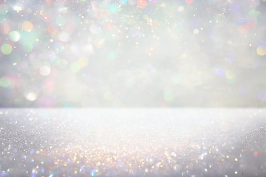 Glitter Silver Lights Background. De-focused