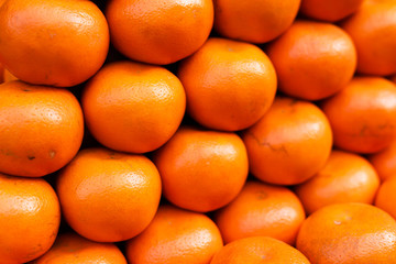 Fresh oranges in market , healthy organic fruits