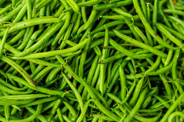 Fresh organic green beans in local marketplace