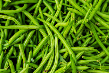 Fresh organic green beans in local marketplace