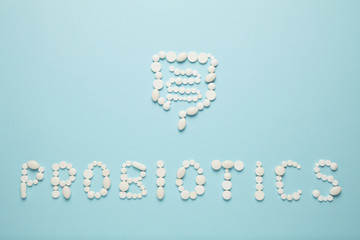 Intestines and pills, probiotics, antibiotics. Gut protection, recovery from illness and treatment.