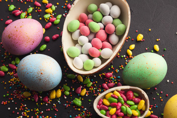 Fototapeta na wymiar Chocolate egg and colorful candies