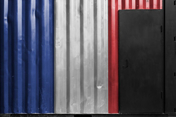 France country flag on a metal container with a black door