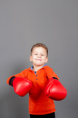 boy posing in boxing glove