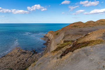 Fototapeta na wymiar North Sea Coast in North Yorkshire, England, UK - seen from the former alum quarry in Kettleness Point