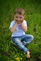 little boy on the grass